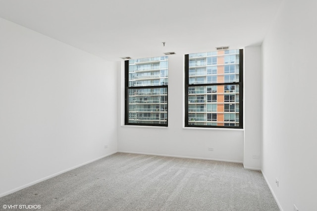 780 S Federal St Unit 1006, Chicago, IL 60605 - carpeted empty room featuring healthy amount of natural light