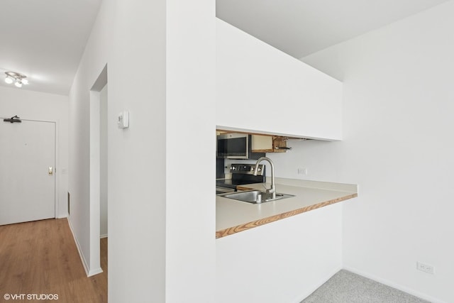 780 S Federal St Unit 1006, Chicago, IL 60605 - kitchen with appliances with stainless steel finishes, light wood finished floors, and light countertops