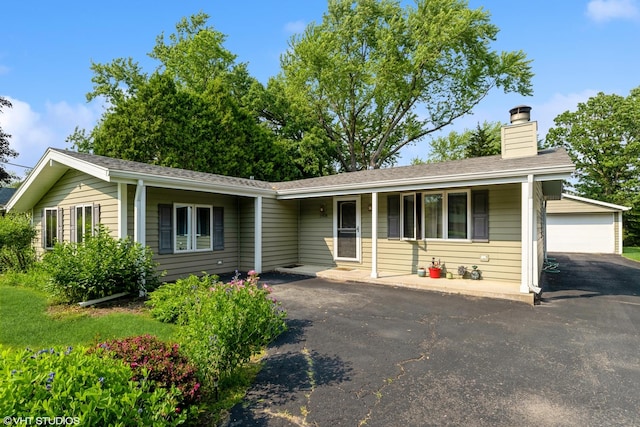 1908 Hazelwood Dr, Lindenhurst, IL 60046 - ranch-style house with an outdoor structure, a chimney, and a detached garage