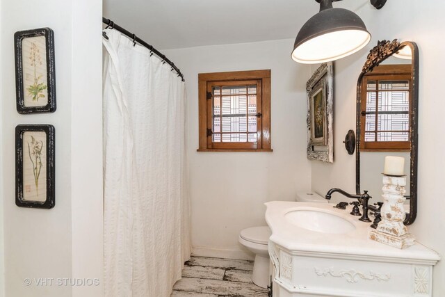 26821 N Oakdale Ln, Mundelein, IL 60060 - full bath with vanity, healthy amount of natural light, a shower with curtain, and wood finished floors