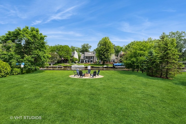 26821 N Oakdale Ln, Mundelein, IL 60060 - view of grassy yard featuring an outdoor fire pit