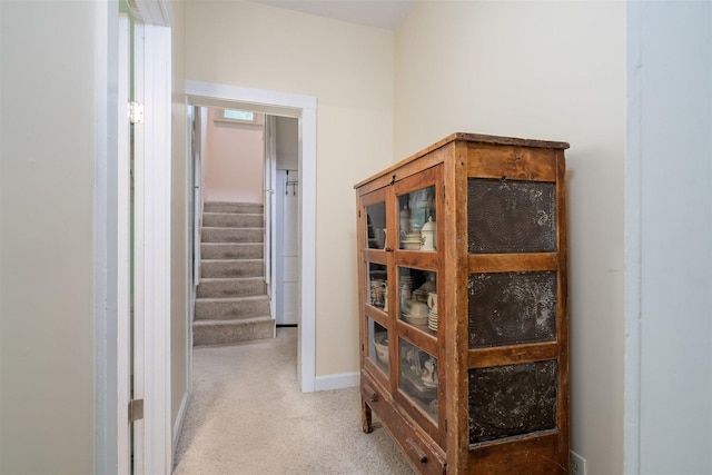 735 W Henry St, Pontiac, IL 61764 - hallway with light colored carpet and stairway