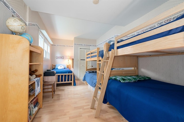 735 W Henry St, Pontiac, IL 61764 - bedroom featuring wood finished floors and wallpapered walls