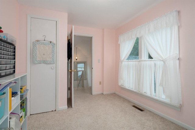 735 W Henry St, Pontiac, IL 61764 - recreation room featuring carpet floors and baseboards