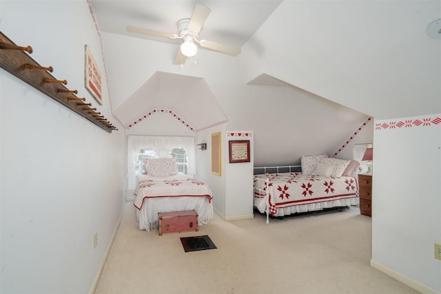 735 W Henry St, Pontiac, IL 61764 - carpeted bedroom with lofted ceiling and ceiling fan