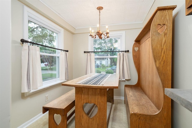 735 W Henry St, Pontiac, IL 61764 - dining room with a chandelier and ornamental molding