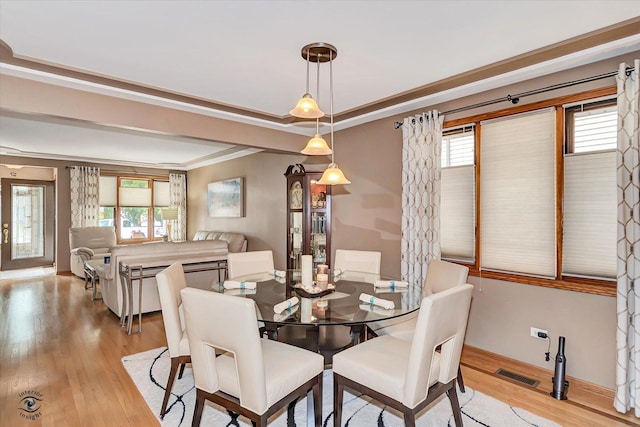 3242 W 108th Pl, Chicago, IL 60655 - dining space featuring ornamental molding and light wood-style floors