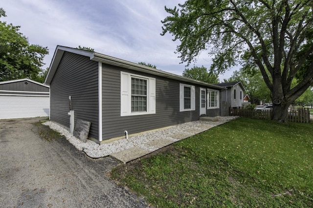 907 Lorelei Dr, Zion, IL 60099 - view of front of home with a garage and an outbuilding