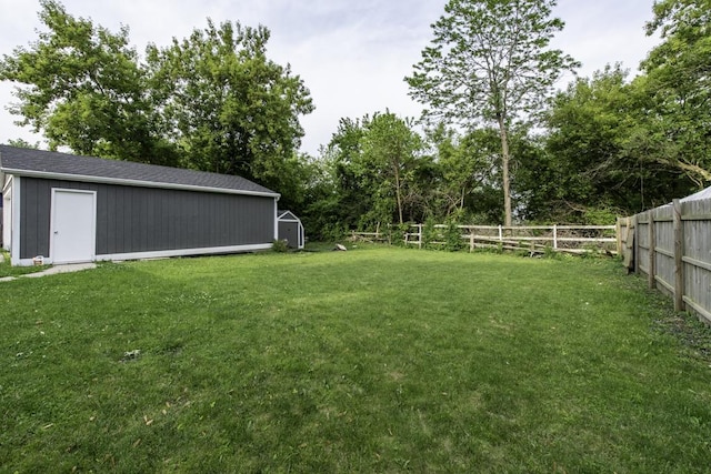 907 Lorelei Dr, Zion, IL 60099 - fenced backyard featuring a shed