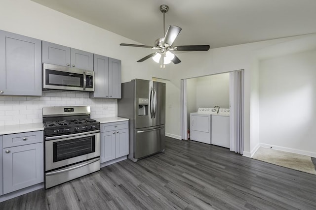 907 Lorelei Dr, Zion, IL 60099 - kitchen featuring appliances with stainless steel finishes, independent washer and dryer, gray cabinetry, and light countertops