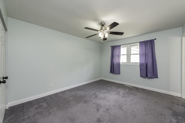 907 Lorelei Dr, Zion, IL 60099 - empty room with ceiling fan and dark colored carpet