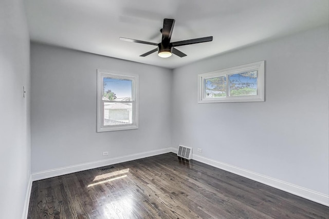 2219 Keystone Ave, North Riverside, IL 60546 - empty room featuring plenty of natural light, dark wood-type flooring, and ceiling fan
