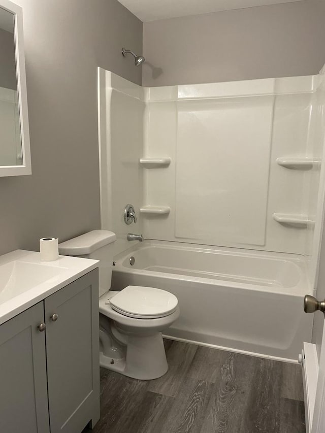 1389 Monomoy St Unit B2, Aurora, IL 60506 - full bath featuring wood finished floors, vanity, and shower / tub combination