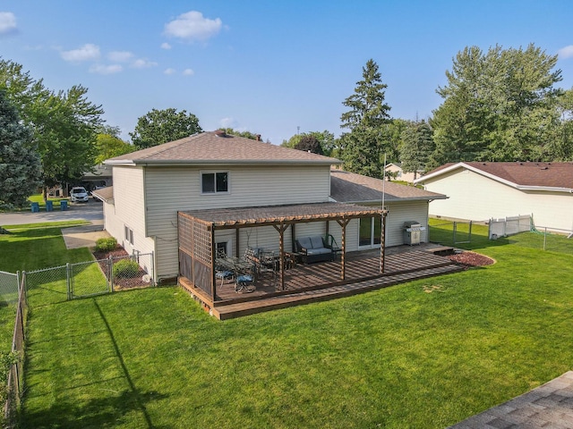350 Kathy Dr, Bourbonnais, IL 60914 - rear view of house with a gate, a wooden deck, a fenced backyard, and a shingled roof