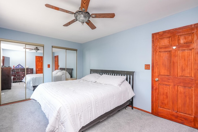 350 Kathy Dr, Bourbonnais, IL 60914 - carpeted bedroom featuring two closets and ceiling fan
