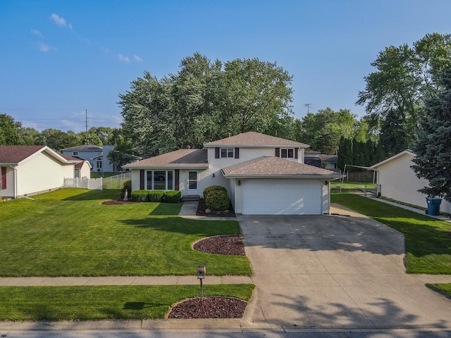 350 Kathy Dr, Bourbonnais, IL 60914 - tri-level home featuring driveway, a garage, and roof with shingles