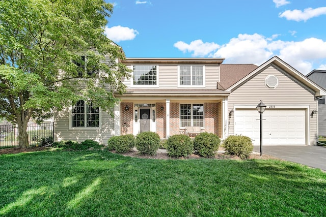 2316 Loop Rd, Algonquin, IL 60102 - traditional-style house with driveway, a garage, and brick siding