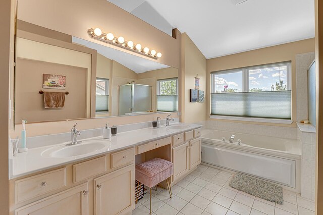 2316 Loop Rd, Algonquin, IL 60102 - full bath featuring tile patterned flooring, double vanity, a garden tub, a shower stall, and lofted ceiling