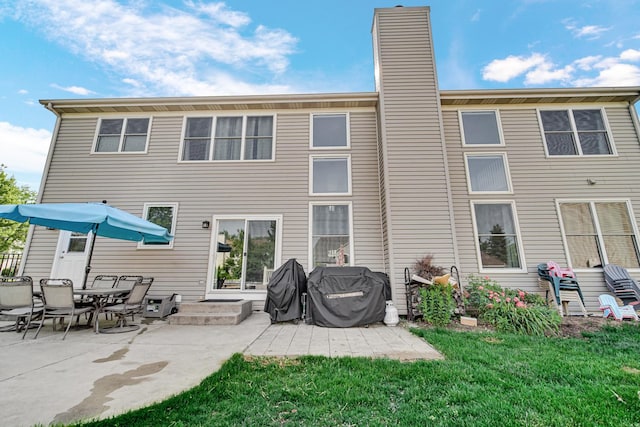 2316 Loop Rd, Algonquin, IL 60102 - rear view of property with a patio area, a chimney, and a yard
