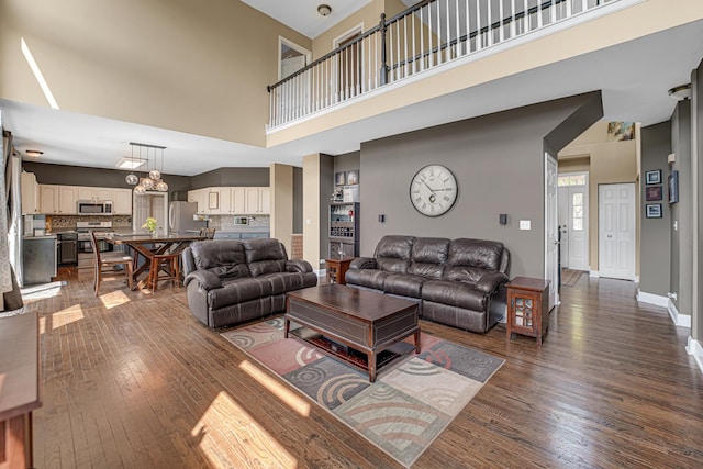 2316 Loop Rd, Algonquin, IL 60102 - living room featuring a towering ceiling and dark wood-style flooring