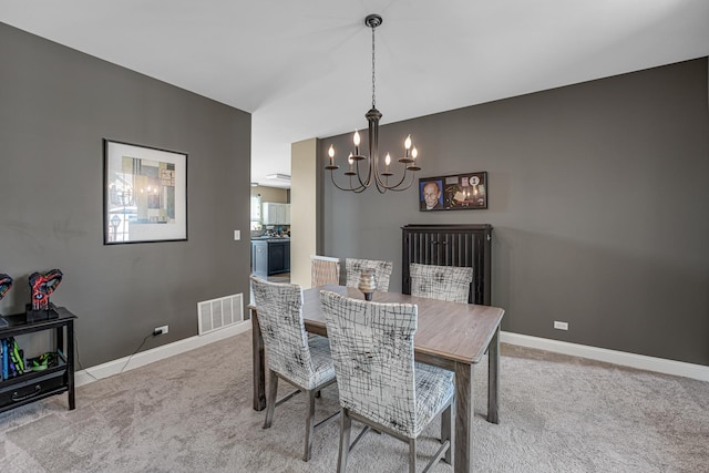 2316 Loop Rd, Algonquin, IL 60102 - dining room with a chandelier and light colored carpet