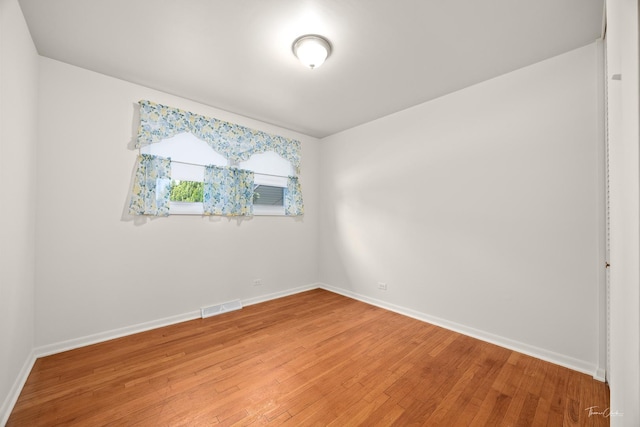 7325 173rd St, Tinley Park, IL 60477 - empty room featuring light wood finished floors and baseboards