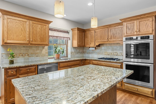 1364 Yorkshire Ln, Carol Stream, IL 60188 - kitchen with stainless steel appliances, light wood-style flooring, light stone counters, decorative backsplash, and decorative light fixtures