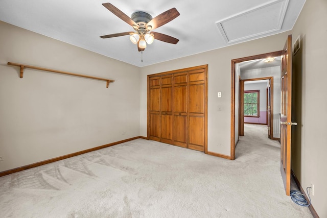 1364 Yorkshire Ln, Carol Stream, IL 60188 - unfurnished bedroom featuring light colored carpet, a ceiling fan, attic access, and a closet