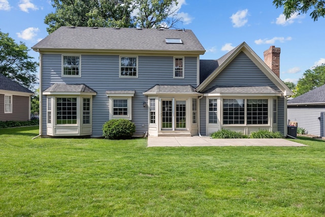 1364 Yorkshire Ln, Carol Stream, IL 60188 - back of house featuring a patio, a yard, and a chimney
