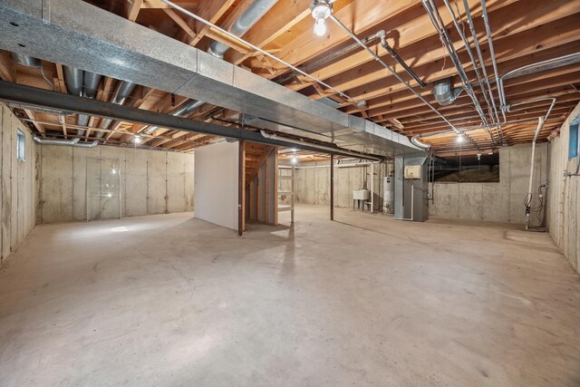 1364 Yorkshire Ln, Carol Stream, IL 60188 - unfinished basement featuring gas water heater and a sink