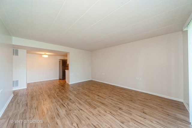 127 N Wolf Rd Unit 52A, Wheeling, IL 60090 - unfurnished room featuring light wood-style flooring and baseboards