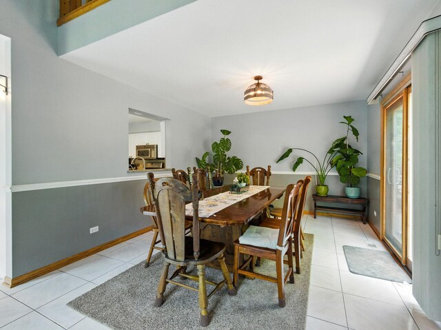 1386 Laurel Oaks Dr, Streamwood, IL 60107 - dining area with light tile patterned floors