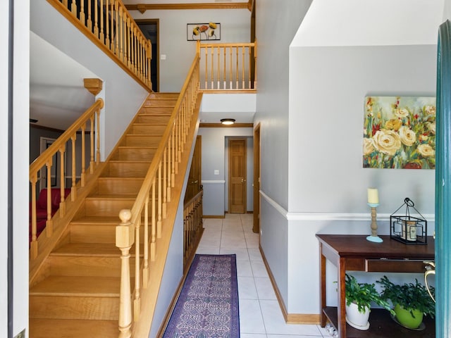 1386 Laurel Oaks Dr, Streamwood, IL 60107 - stairway with tile patterned floors and a high ceiling