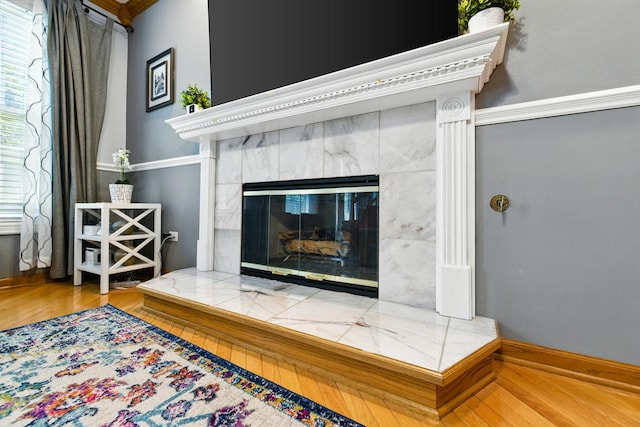 1386 Laurel Oaks Dr, Streamwood, IL 60107 - detailed view of wood finished floors and a fireplace