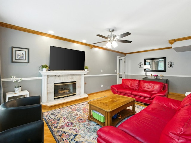 1386 Laurel Oaks Dr, Streamwood, IL 60107 - living room with a ceiling fan, wood finished floors, ornamental molding, a fireplace, and recessed lighting