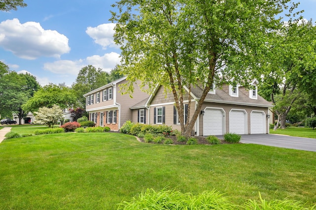 833 Manassas Ct, Naperville, IL 60540 - view of front of home featuring asphalt driveway, a front lawn, and a garage