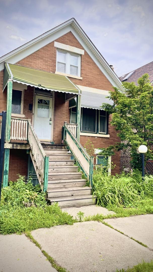 2239 S Kildare Ave, Chicago, IL 60623 - view of front of house featuring brick siding and stairs