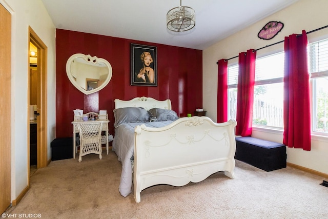 4321 Dillon St, Plano, IL 60545 - carpeted bedroom featuring an accent wall