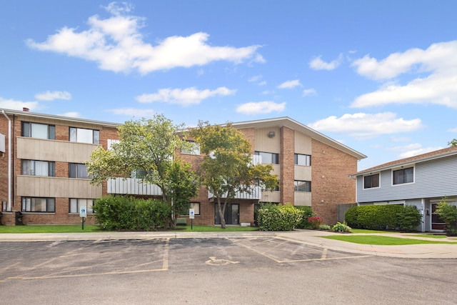 2000 Bayside Dr Unit 204, Palatine, IL 60074 - view of building exterior featuring uncovered parking