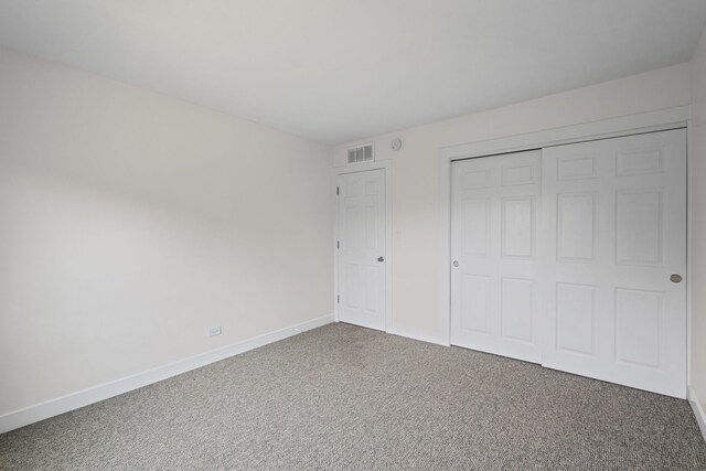 2000 Bayside Dr Unit 204, Palatine, IL 60074 - unfurnished bedroom with carpet and a closet