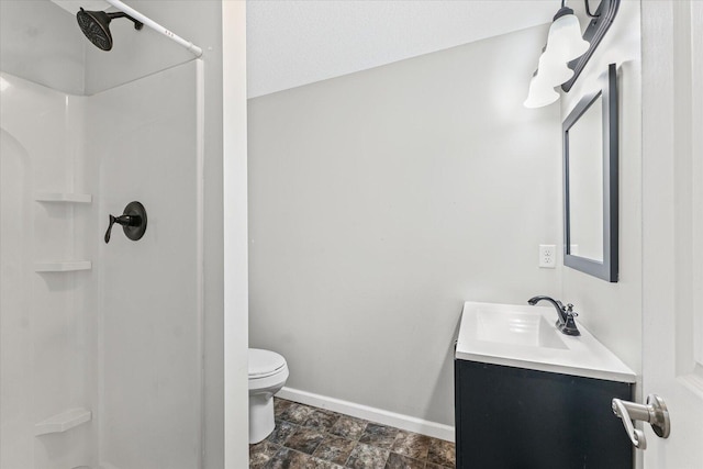 1391 W Decatur St, Decatur, IL 62522 - bathroom featuring vanity, a shower, and stone finish flooring