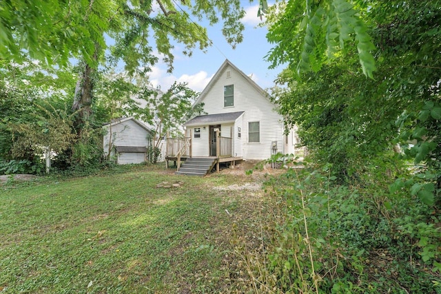 1391 W Decatur St, Decatur, IL 62522 - rear view of house featuring a yard