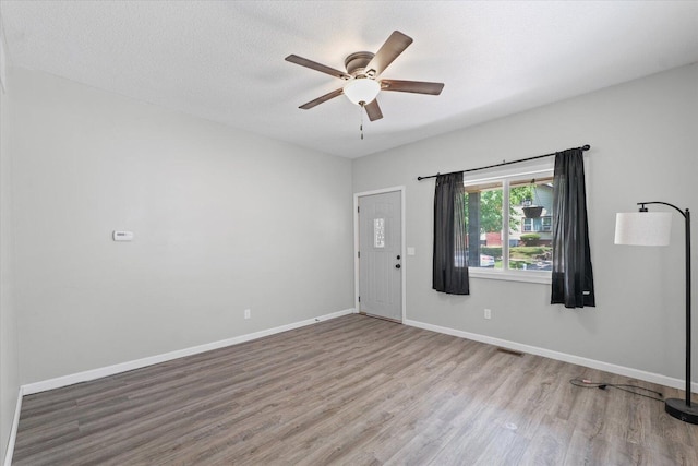 1391 W Decatur St, Decatur, IL 62522 - unfurnished room with wood finished floors and ceiling fan