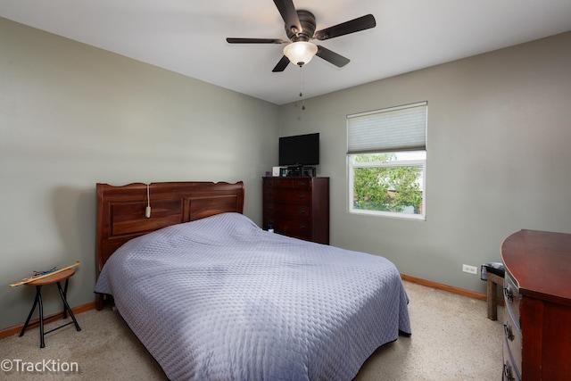 6158 W 60th St, Chicago, IL 60638 - bedroom with baseboards, light carpet, and a ceiling fan