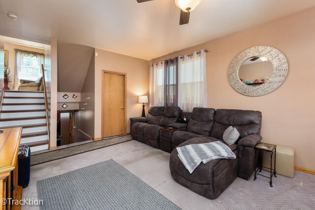 6158 W 60th St, Chicago, IL 60638 - carpeted living room with ceiling fan, baseboards, and stairway