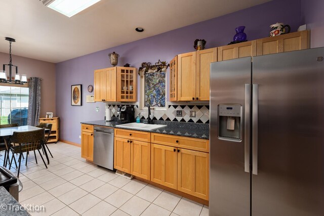 6158 W 60th St, Chicago, IL 60638 - kitchen with stainless steel appliances, a sink, decorative backsplash, light tile patterned floors, and glass insert cabinets