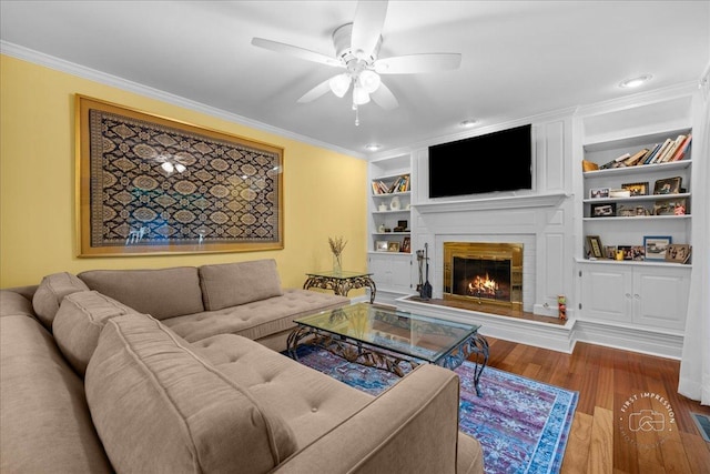 1519 Wedgefield Cir, Naperville, IL 60563 - living area with ornamental molding, a fireplace, wood finished floors, ceiling fan, and built in features