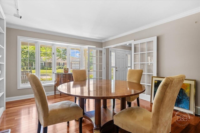 1519 Wedgefield Cir, Naperville, IL 60563 - dining room featuring ornamental molding, wood finished floors, and rail lighting