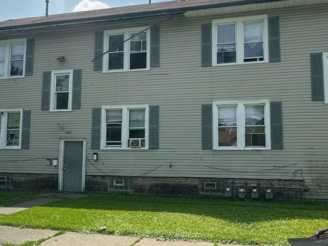 15201 Turlington Ave, Harvey, IL 60426 - rear view of house featuring a yard