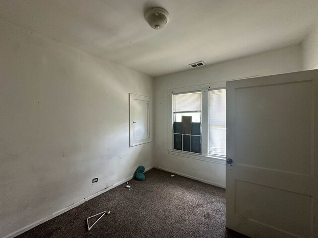 15201 Turlington Ave, Harvey, IL 60426 - spare room with carpet and baseboards